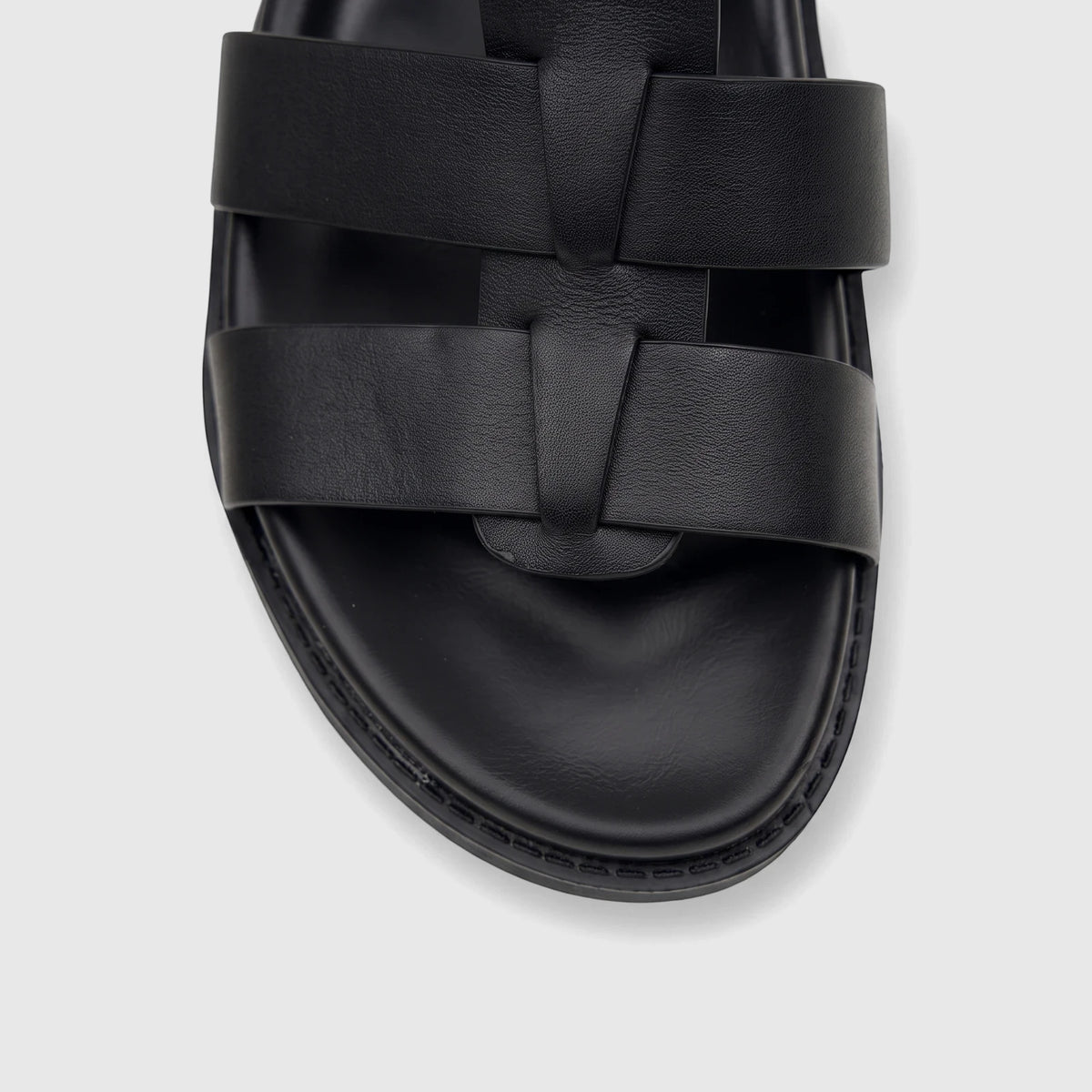 Front view of a black Fabino Men's Leather Comfort Sandal with thick leather straps and stitched sole, for everyday wear.