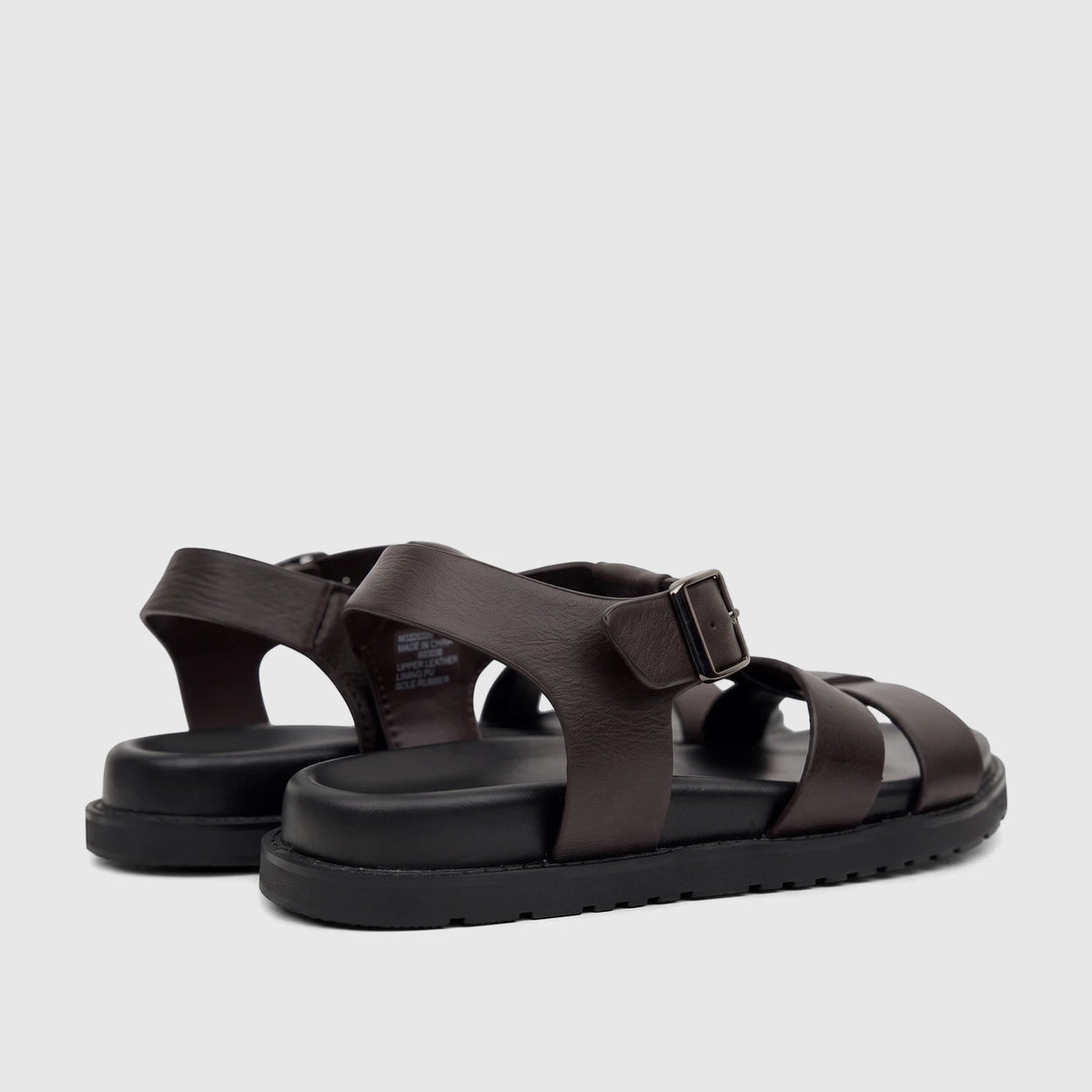A pair of Fabino Men's Leather Comfort Sandals in dark brown, featuring leather straps and chunky black soles, shown on a