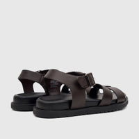 A pair of Fabino Men's Leather Comfort Sandals in dark brown, featuring leather straps and chunky black soles, shown on a