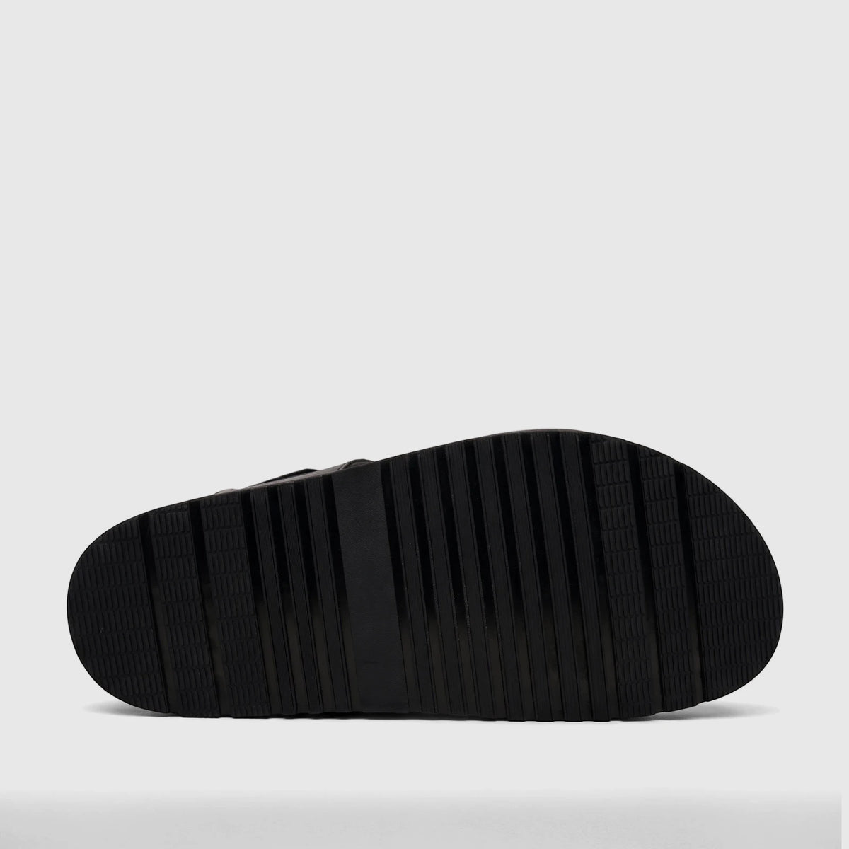 Black Fabino men's leather comfort sandal, style M3220236, shown from the bottom view highlighting its ribbed sole pattern.
