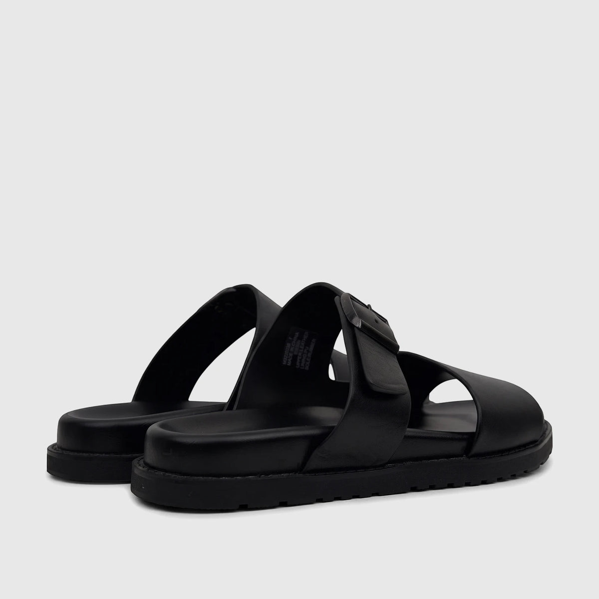 Black Fabino Men's Leather Comfort Sandals M3220238, viewed from a diagonal rear angle, showcasing the buckle and thick sole.