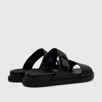Black Fabino Men's Leather Comfort Sandals M3220238, viewed from a diagonal rear angle, showcasing the buckle and thick sole.