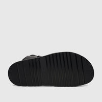 Underside view of a black Fabino men's leather comfort sandal, showcasing its durable ribbed sole pattern.