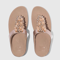 Pair of women's Fit Flop Fino Bauble Bead sandals in classic beige with decorative pink and silver bead embellishments,