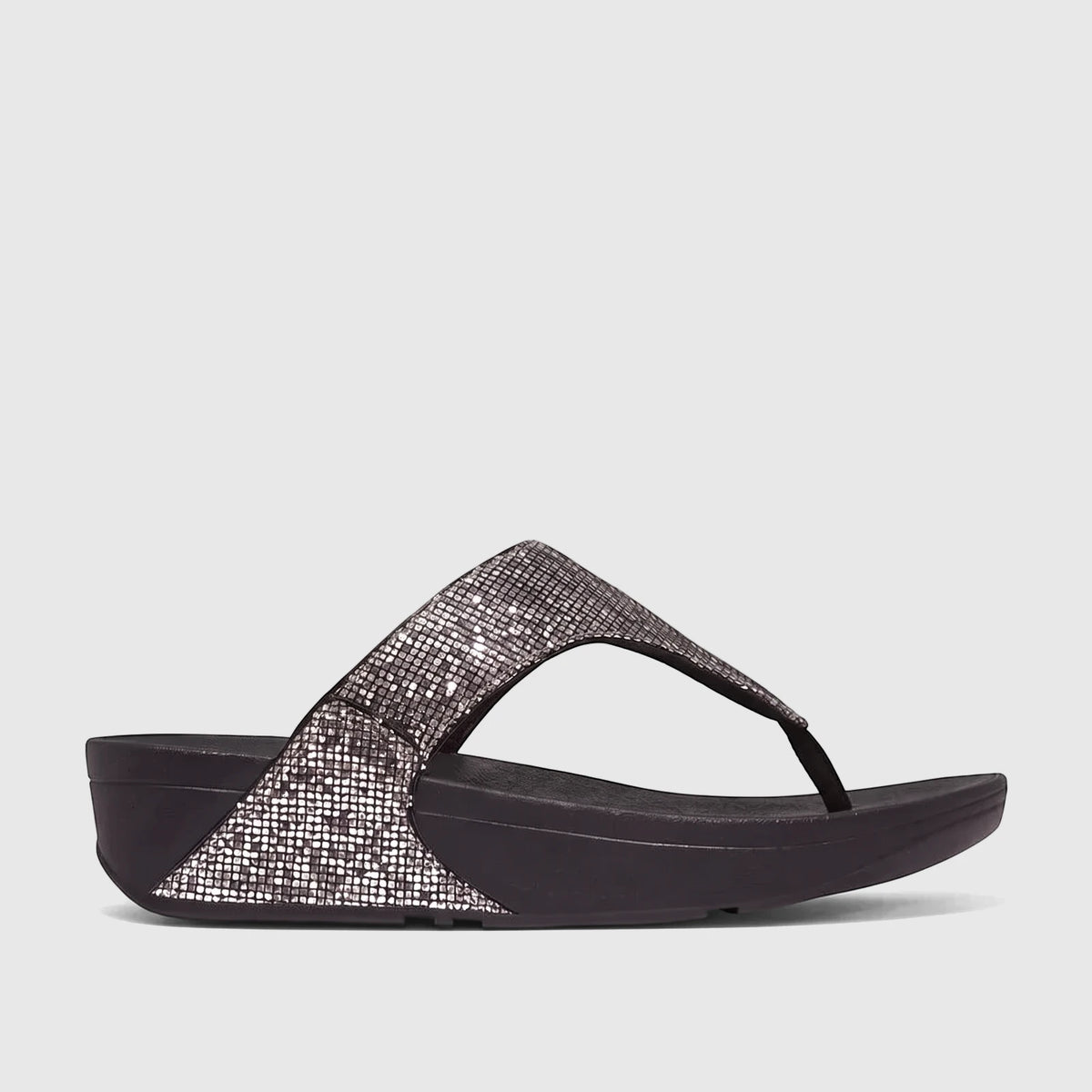 Fit Flop Ladies Comfort Sandal Lulu Glitterball with silver glitter straps and a black comfort sole, shown in a side view.