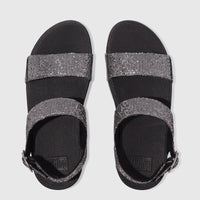 Pair of Fit Flop Lulu Glitterball Back Strap sandals in silver and black, viewed from above. Women's comfort sandals with
