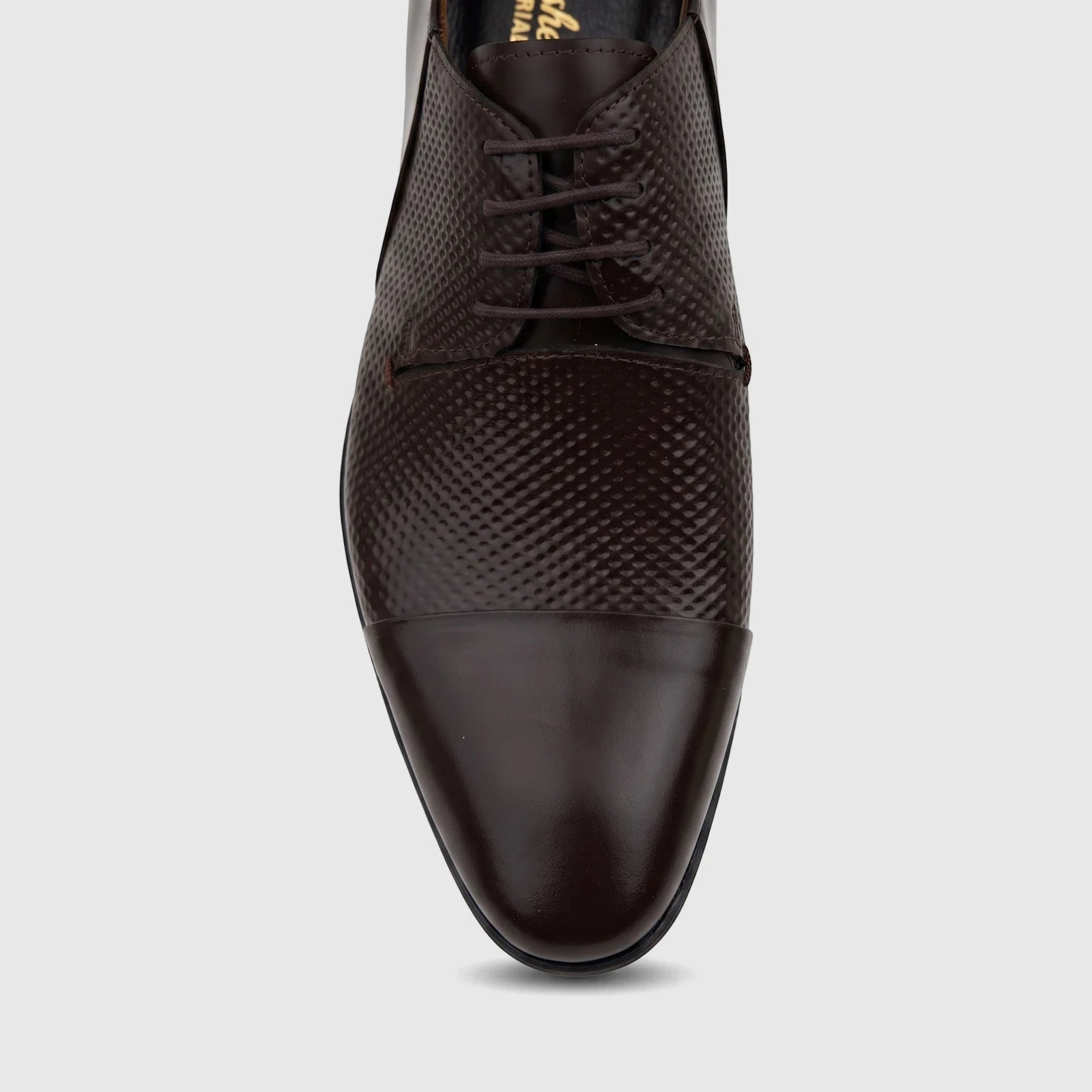 Close-up of a single brown Florsheim Imperial men's lace-up Palu dress shoe with a textured body and polished toe.