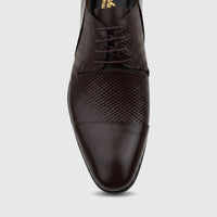 Close-up of a single brown Florsheim Imperial men's lace-up Palu dress shoe with a textured body and polished toe.