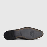 Sole of a brown Florsheim Imperial men's lace-up shoe, showing brand name and size 40 on the bottom.