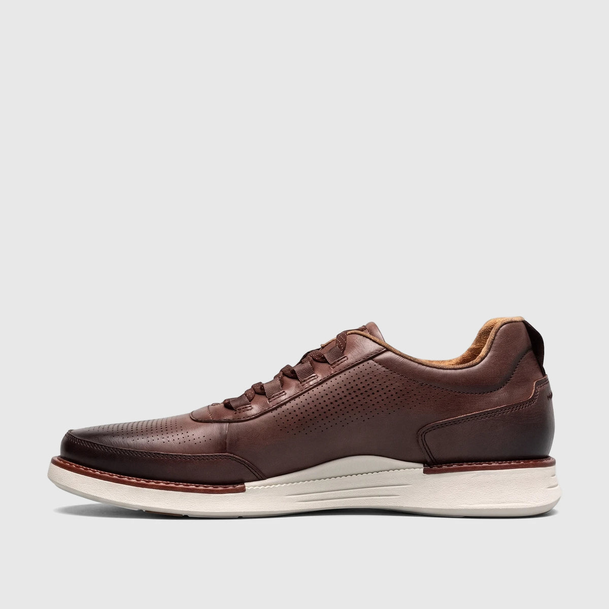 Florsheim Men's Launch Elastic Lace Slip On shoe in T.Moro (dark brown) leather, side profile view.