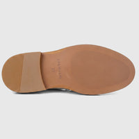 Formale ladies leather loafer, sole view, featuring a tan brown rubber outsole with grip patterns and brand lettering.