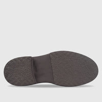 Bottom view of a brown Formales leather chunky sole lace-up oxford shoe, showcasing the textured rubber sole.