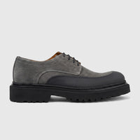 Side view of a Formales men's 0591 grey suede lace-up shoe featuring a robust black chunky sole and rubberized toe cap.