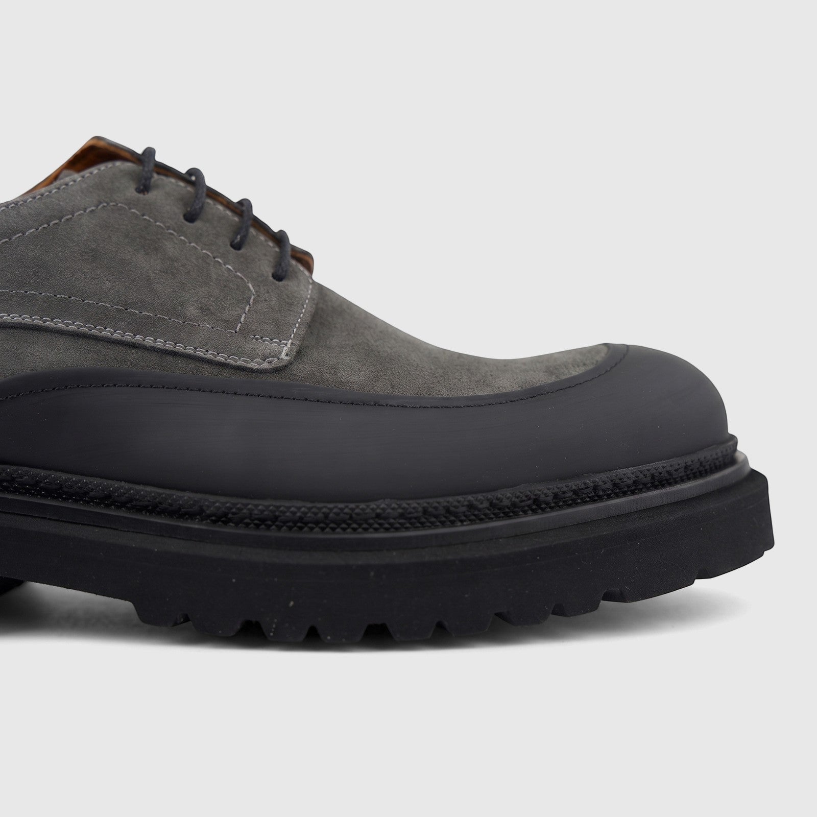 Formales Men's 0591 lace-up shoe in grey suede with a chunky black sole, shown in a side profile view.