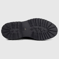 Bottom view of a black Formales Men's chunky lug sole, showcasing its textured pattern and '41' size mark.