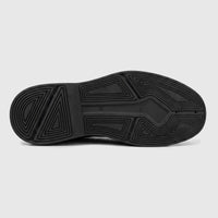Bottom view of a Formles men's black leather chunky sole lace-up shoe, showing its geometric tread pattern and size 41.