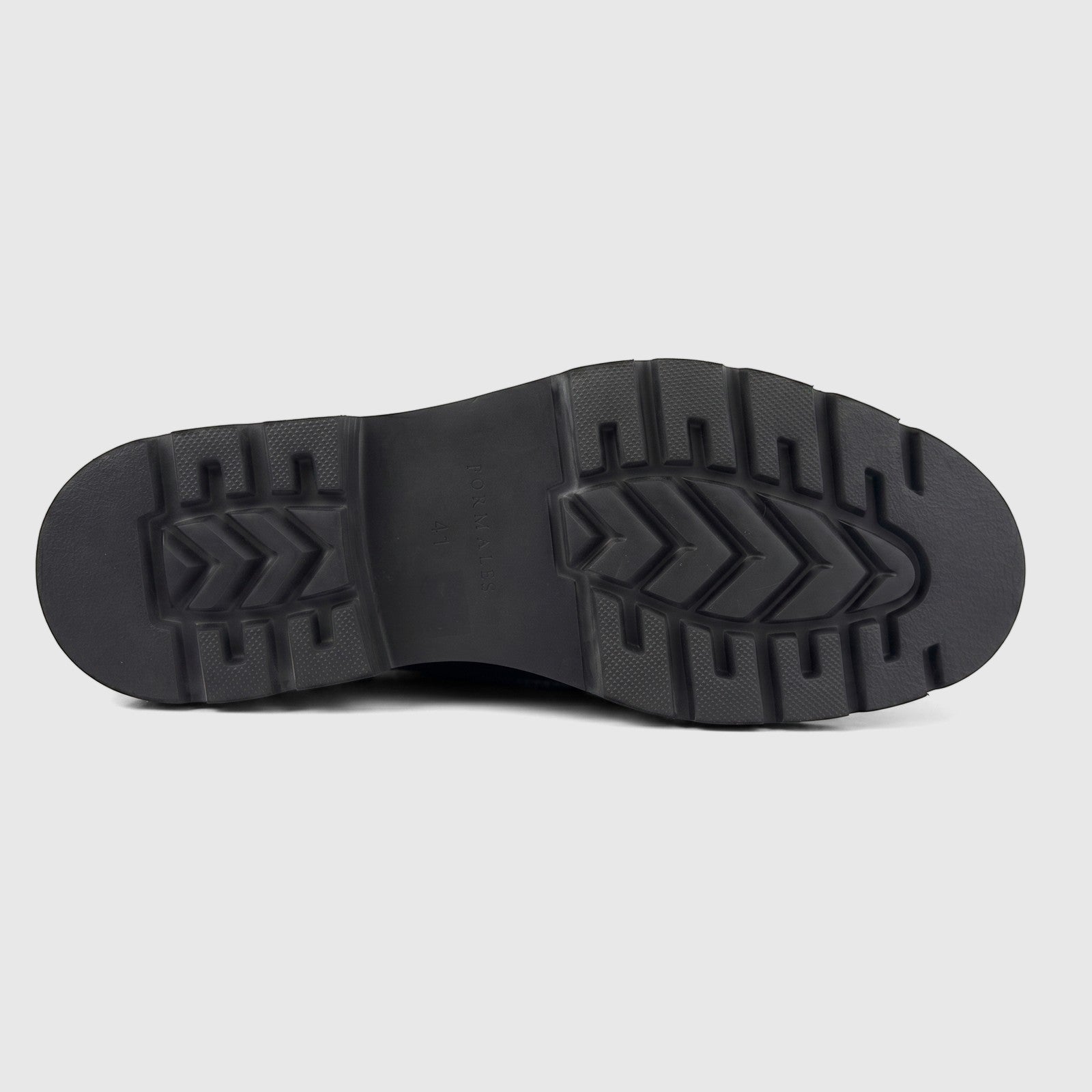Bottom view of a Formales men's black chunky sole, showing textured rubber tread and embossed branding.