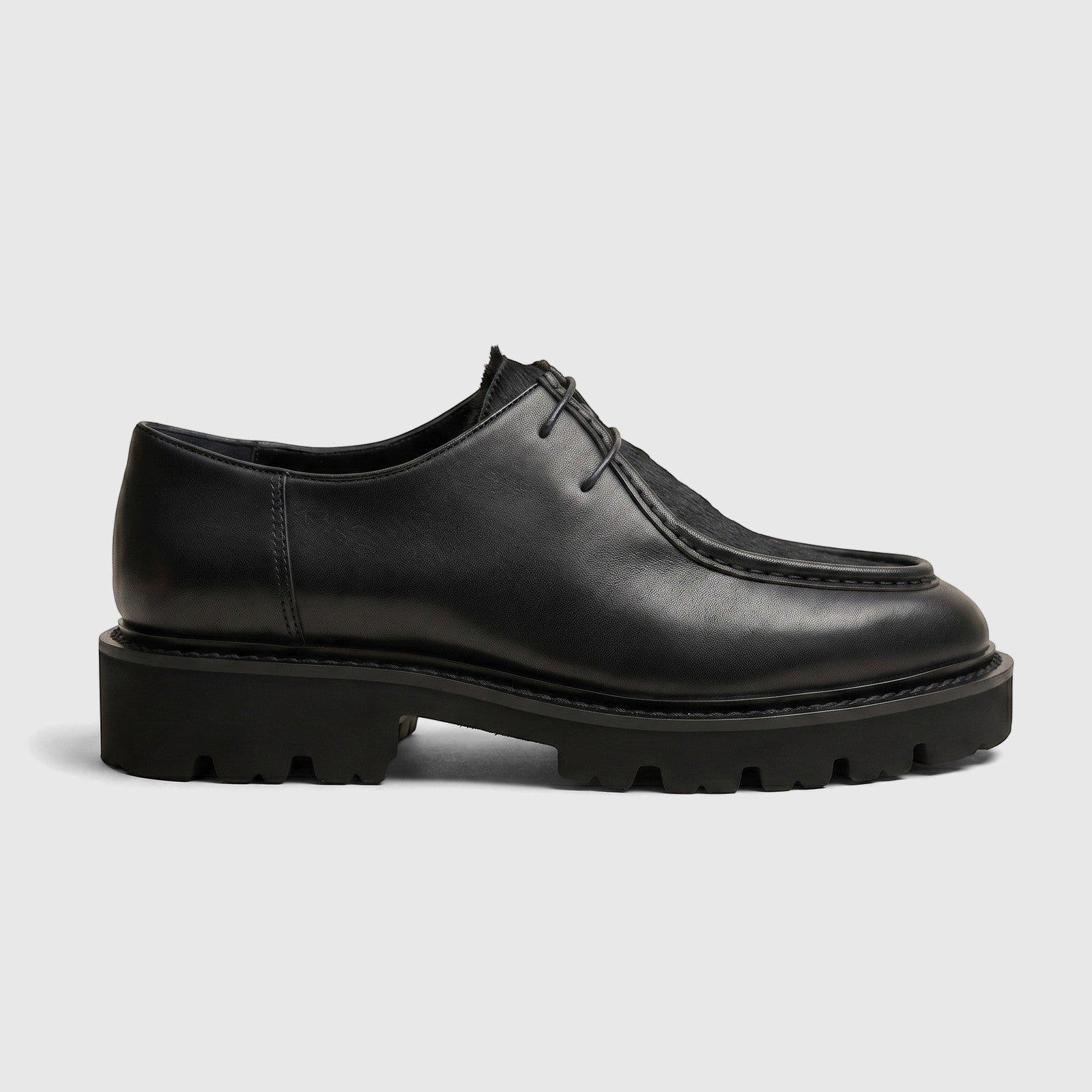Formales men's black leather chunky sole lace-up shoe, side view, featuring a lug sole and detailed stitching.