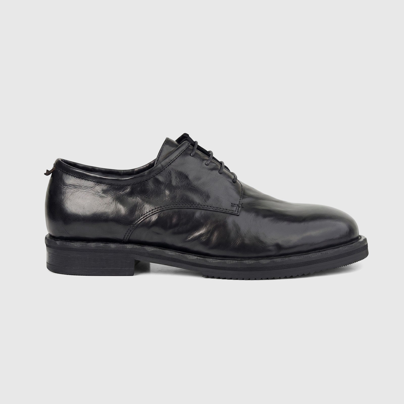 Formale's Men's black leather lace-up shoe with a chunky sole, shown in a side view on a white background.