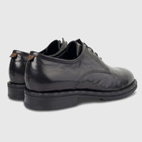 Formales Men's black leather lace-up shoes with chunky soles, shown from a side and back view in a studio setting.