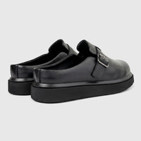 Formals Men's Black Leather Chunky Sole Mules, shown from a side-rear view, featuring a silver buckle and pebbled texture.