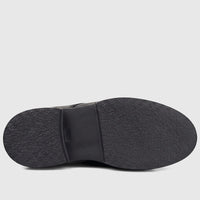 Formales Men's black leather shoe with a chunky textured sole, viewed from directly underneath.