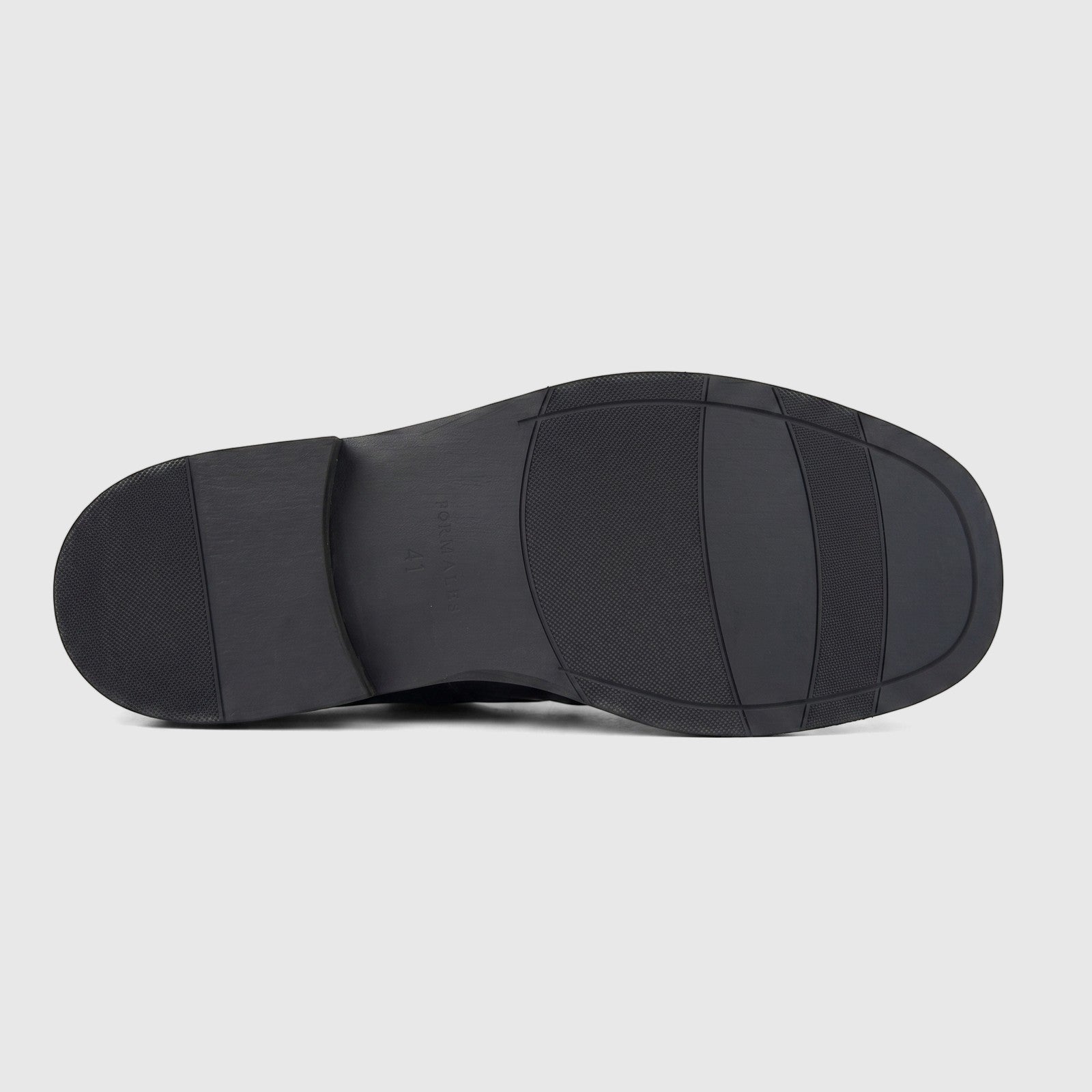Underside view of a Formales men's black leather slip-on shoe, featuring a chunky sole with textured patterns and branding.