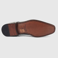 Formales Men's black leather dress shoe, lace-up style, displaying the detailed brown leather sole with brand markings and a