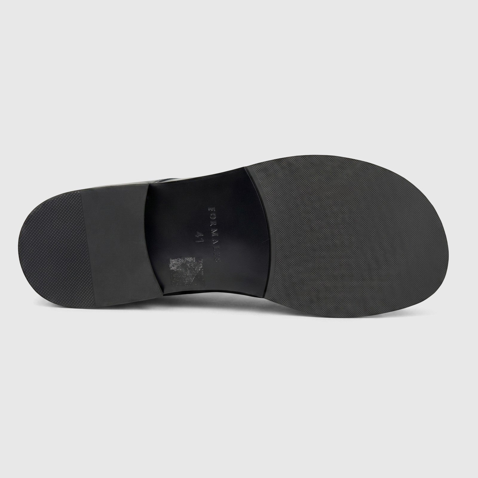 Sole of a Formales men's black leather lace-up shoe with brand and size 41 visible, viewed from below.