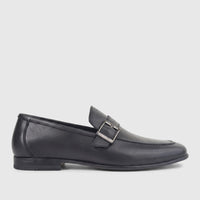 Formales Men's black leather loafer with a sleek design and a silver buckle on the vamp, viewed from the side.