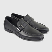 Formales Men's black leather loafer shoes with a silver-tone buckle, presented from a high angle view on a plain white