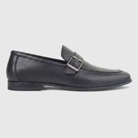 Formale's Men's black leather loafer with a silver buckle, viewed from the side profile against a a plain white background.