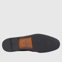 Bottom view of a Formales men's black leather loafer, displaying the sole with "FORMALES 41" embossed details.