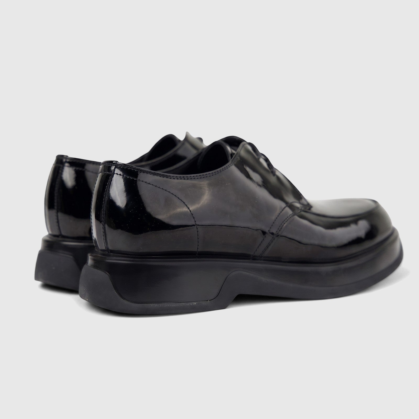 Formales Men's black patent leather chunky sole lace-up shoes, shown from a rear-side angle on a white background.
