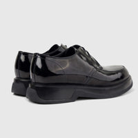 Formales Men's black patent leather chunky sole lace-up shoes, shown from a rear-side angle on a white background.