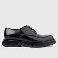 Formales men's black hi-shine patent leather chunky sole lace-up dress shoe in a profile view.