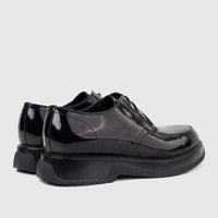 Formales Men's black patent leather chunky sole lace-up shoes, shown in a rear-side view highlighting the glossy finish.