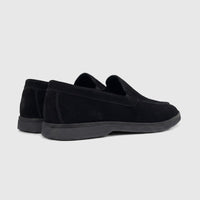 Rear-side view of Formales men's black suede leather loafers with rubber soles, showcasing their classic slip-on design.