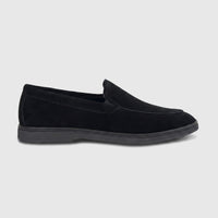 Black suede men's loafer shoe in a side profile, featuring a clean silhouette and detailed stitching, suitable for formal or
