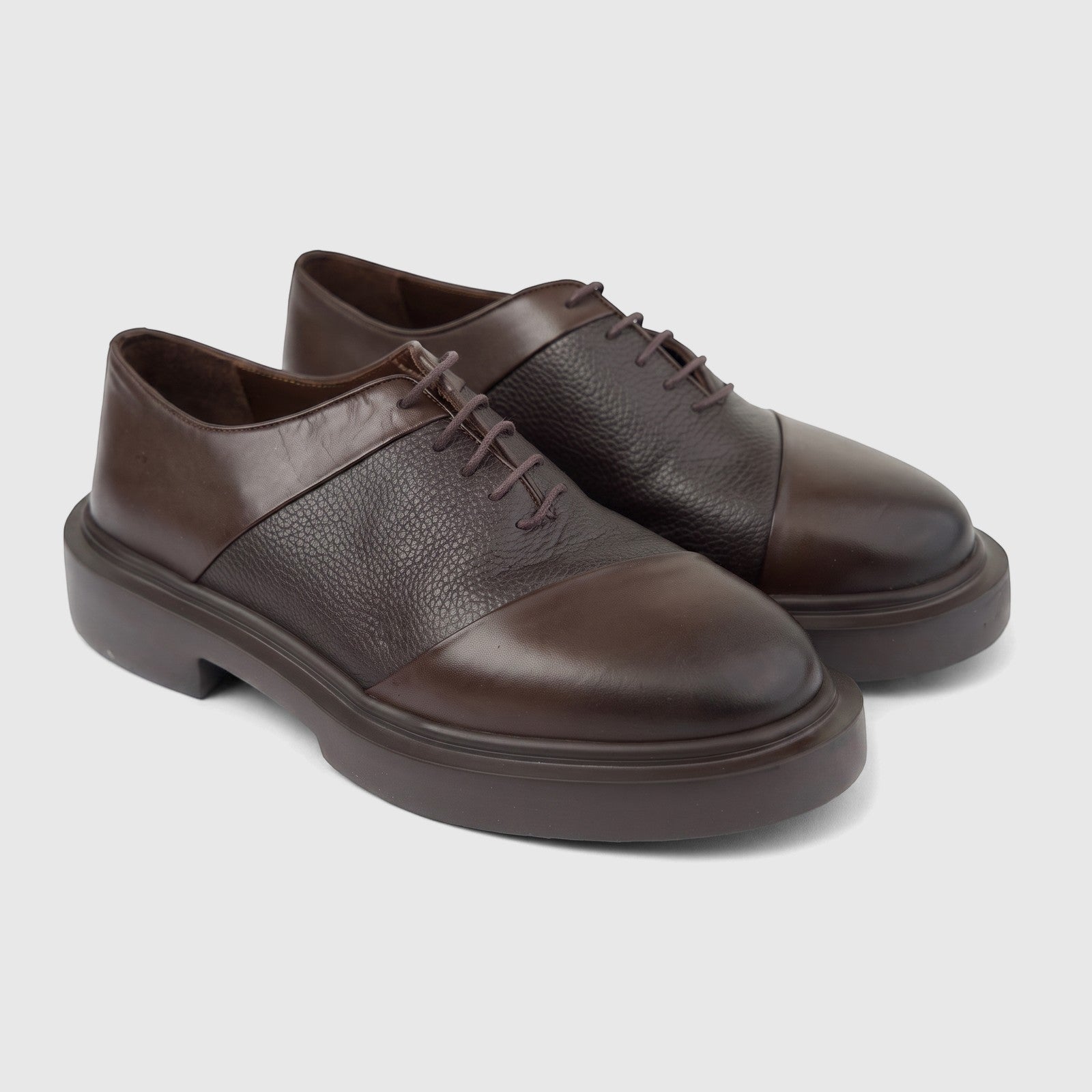 Formales men's brown leather chunky sole lace-up shoes, featuring both smooth and textured leather sections, presented on a