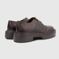 Pair of Formale's men's brown leather chunky sole lace-up shoes, shown from a rear and side view on a white background.