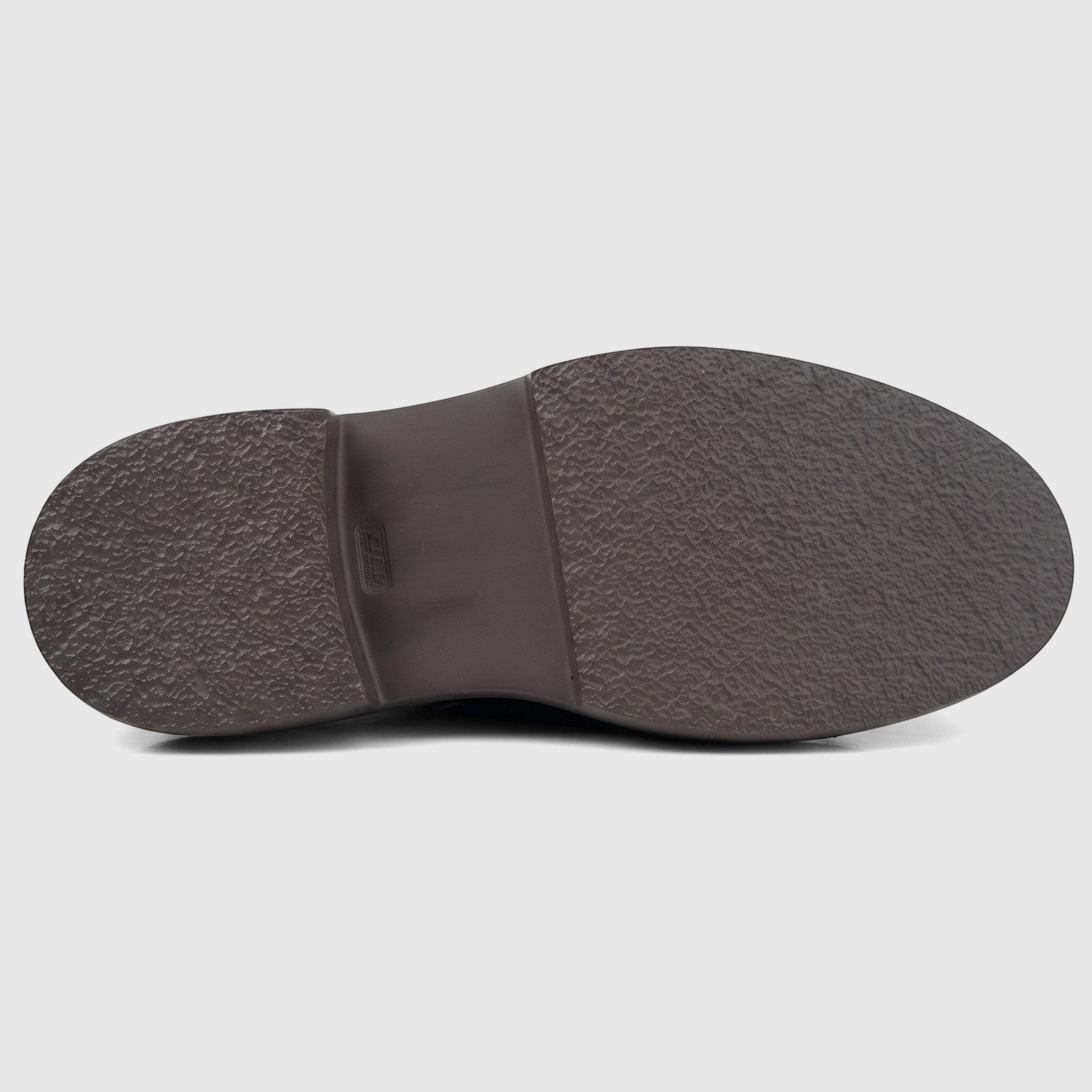 Bottom view of a Formales men's brown leather shoe, highlighting its chunky, textured sole and "F.LLI. Soft Leather"