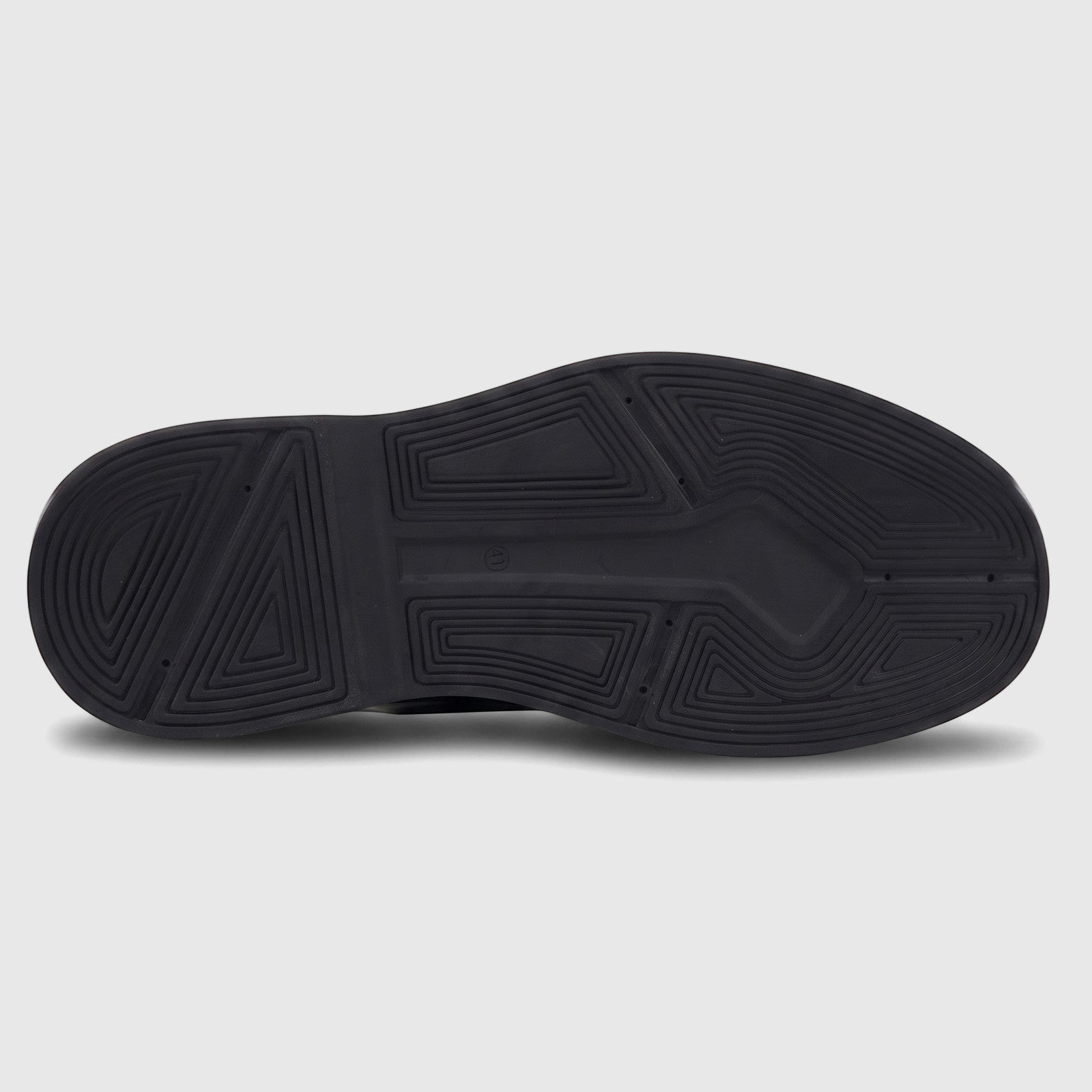 Formales Men's chunky black shoe sole showing the unique geometric tread pattern from a bottom view.