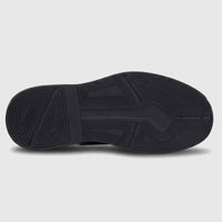 Formales Men's chunky black shoe sole showing the unique geometric tread pattern from a bottom view.