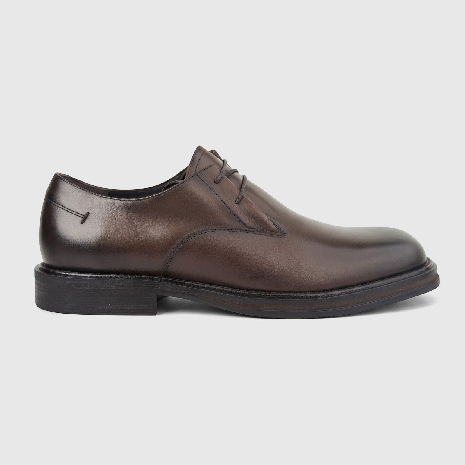 Formales men's chunky sole slip-on shoe in coffee brown leather, shown in a side profile view.