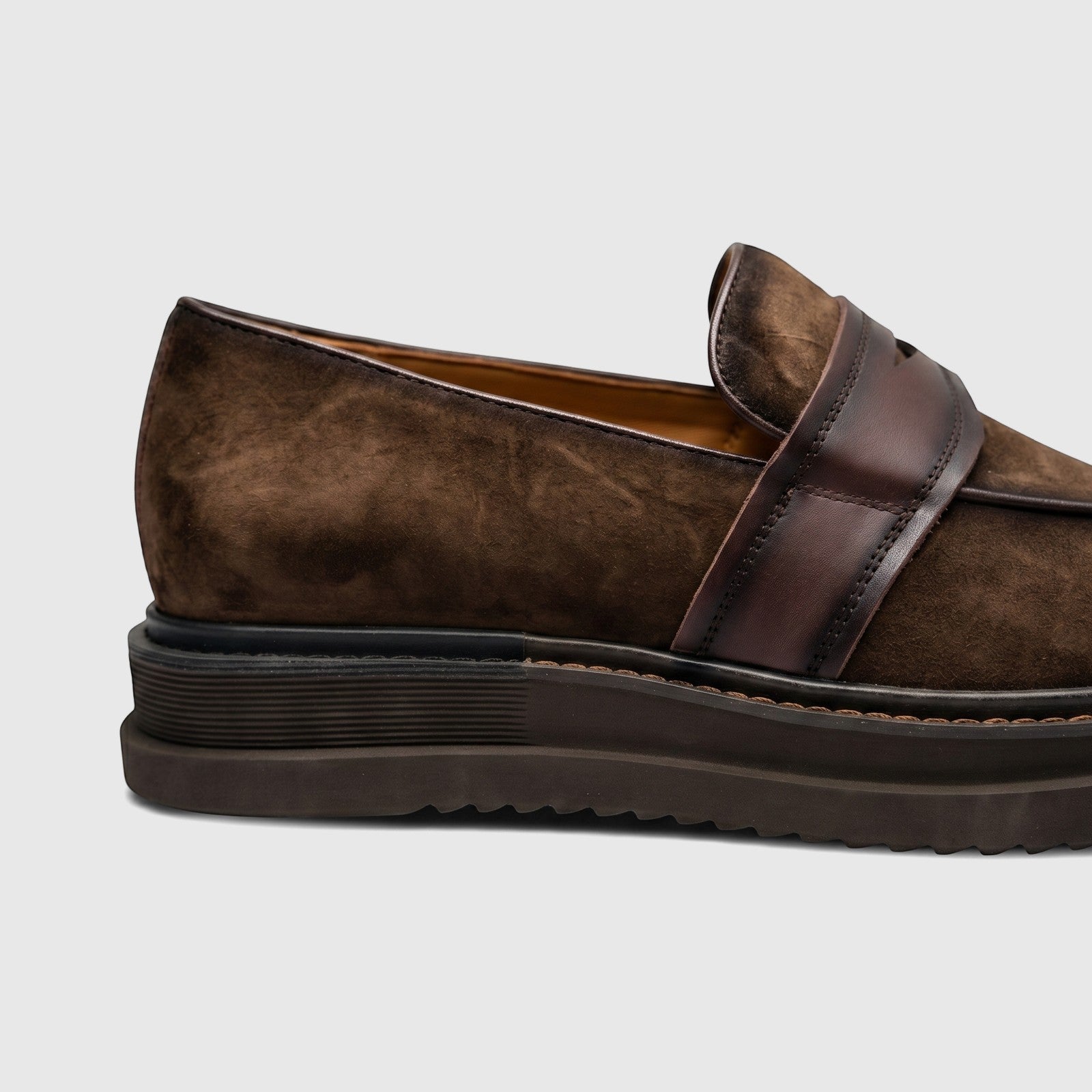 Side view of a Formale's Men's chunky sole slip-on loafer in coffee brown suede with a dark leather strap.