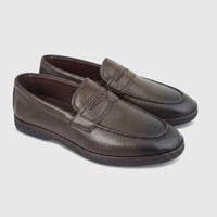 Pair of Formales Men's FT268012 coffee brown leather slip-on loafers, featuring detailed stitching and a classic penny strap