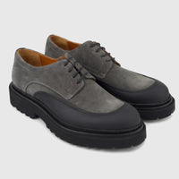 Formales men's grey suede lace-up shoes with a black chunky lug sole on a white background, angled view.