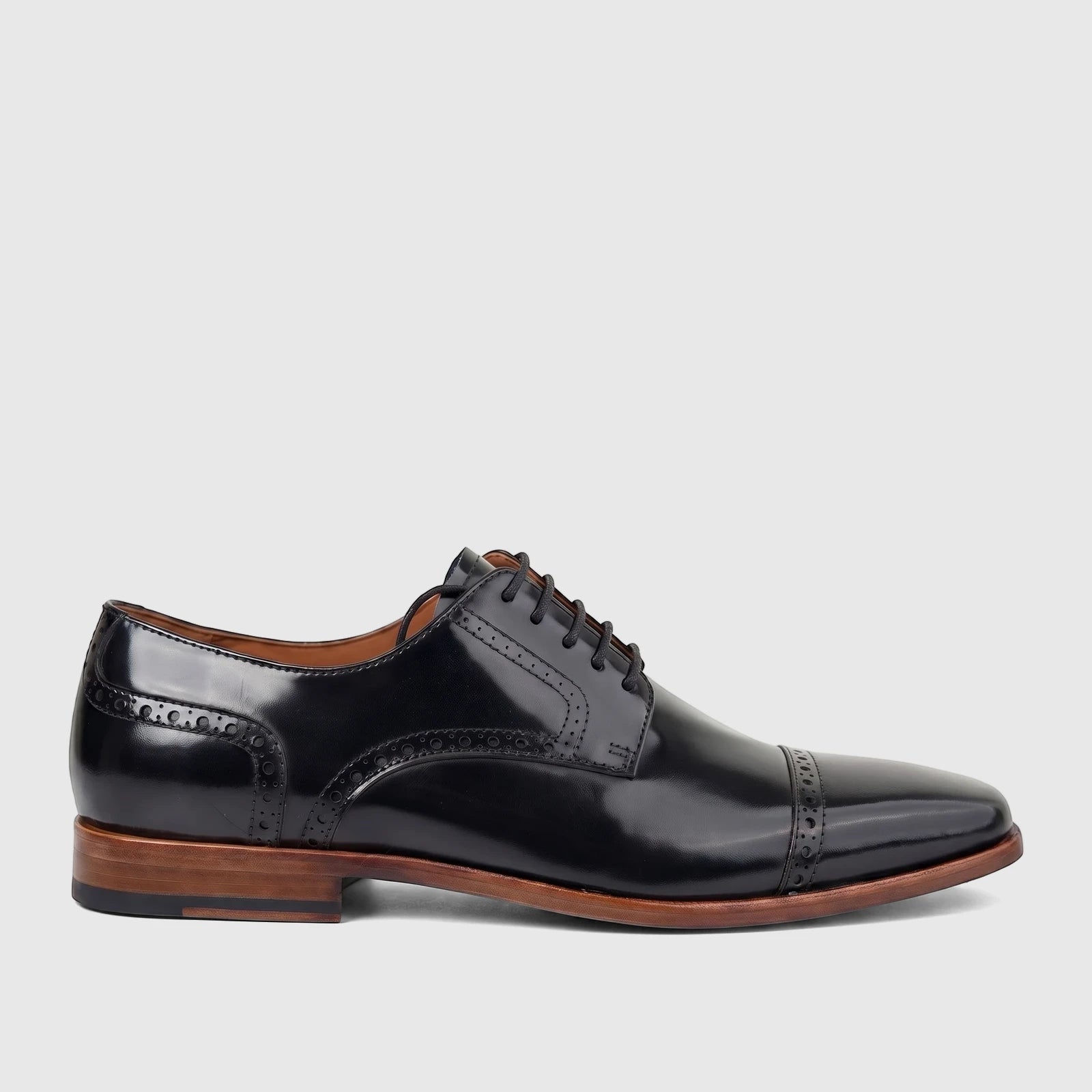 Black men's Formales leather cap-toe oxford dress shoes with lace-up closure and brogue detailing, shown from a side view.