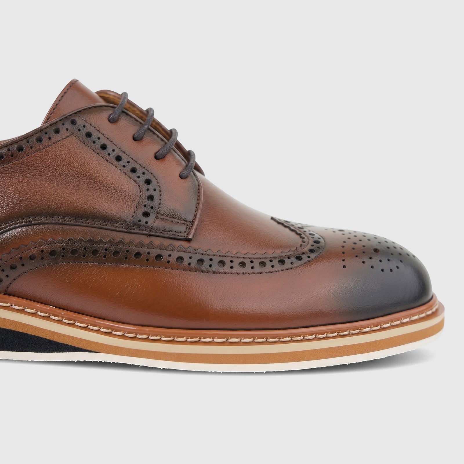 Formales Men's Leather Casual Lace Up FW267027 shoe in brown, featuring brogue detailing, captured from a side view.